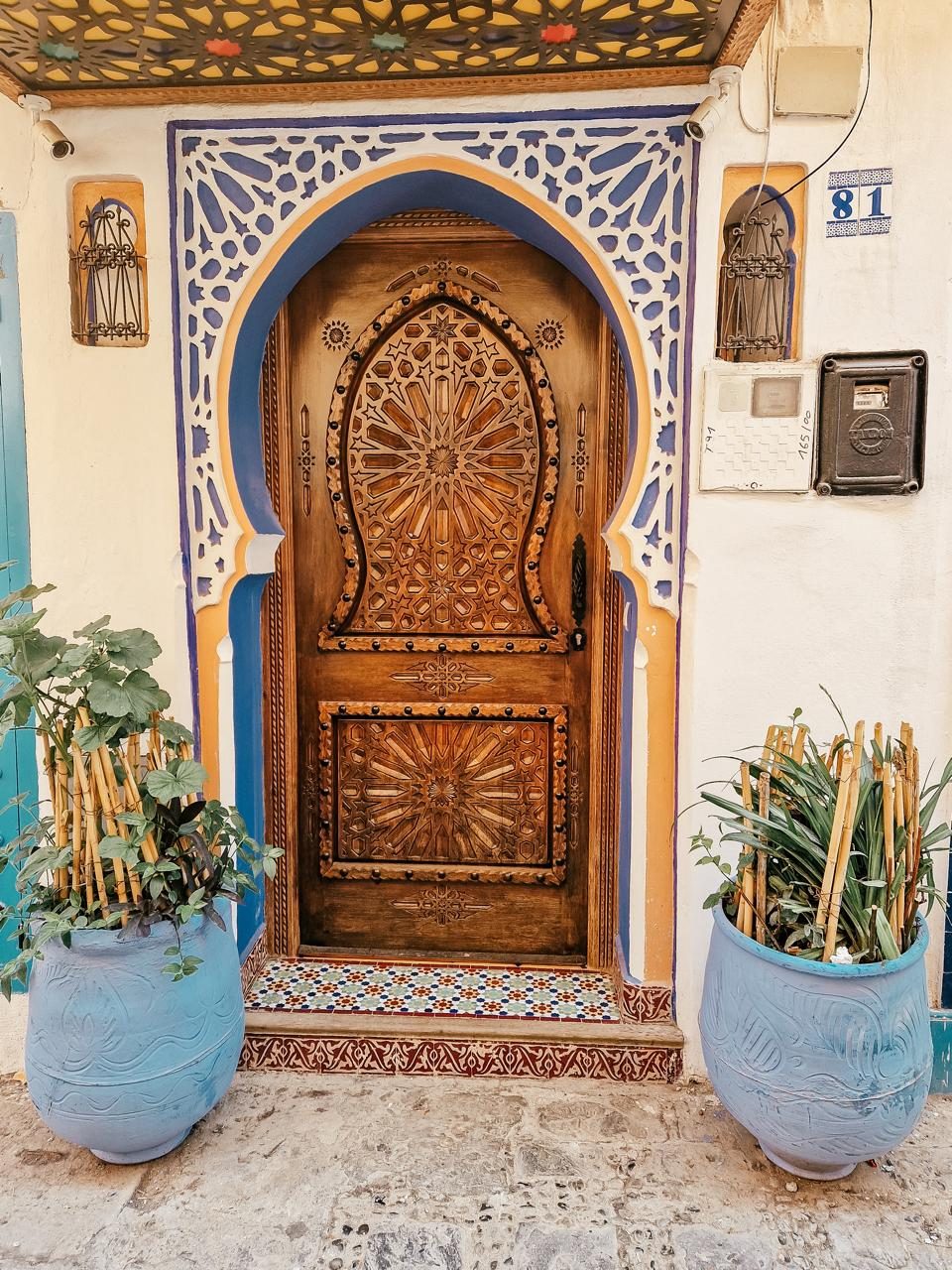 A carved and painted medina doorway
