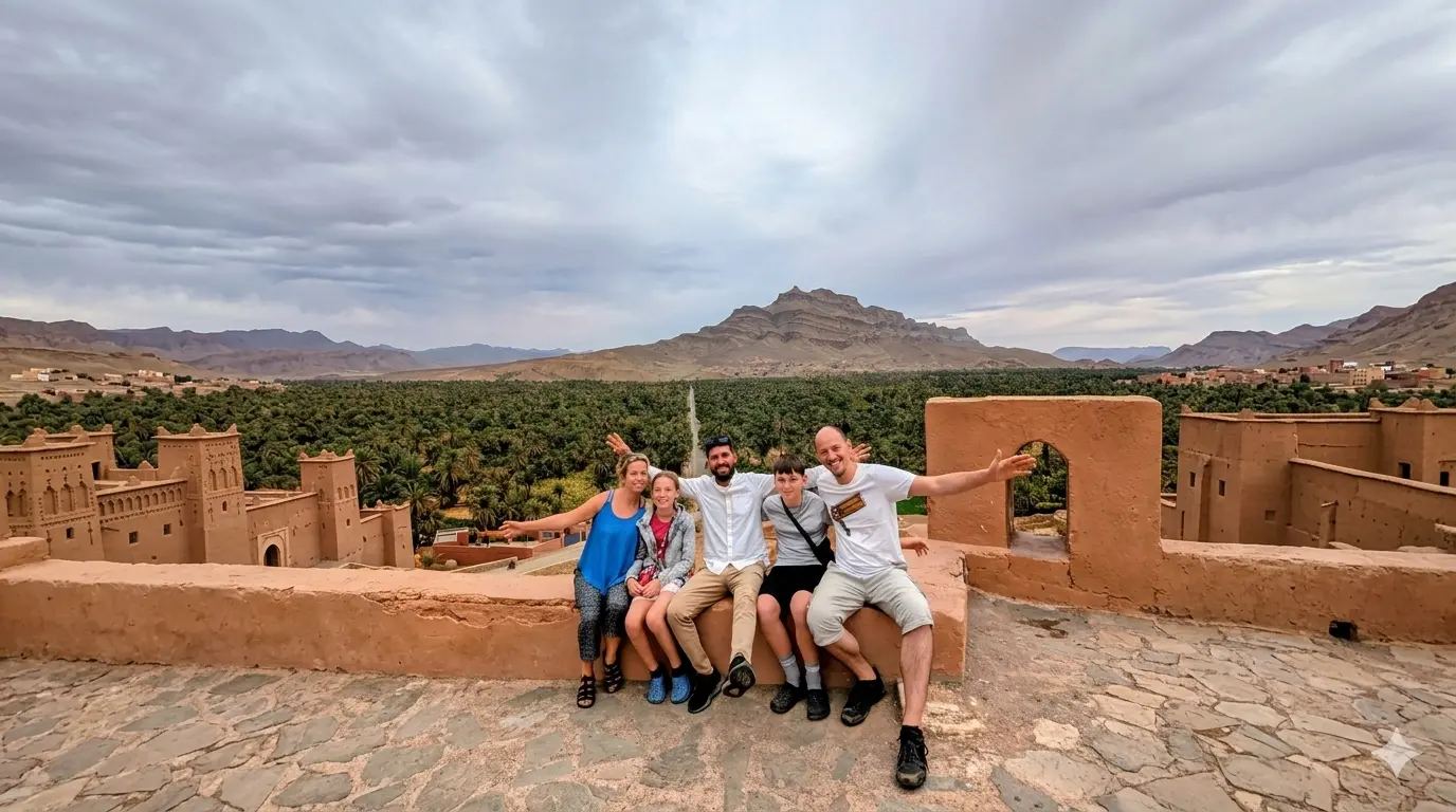 Travelers on a kasbah rooftop during a Through Morocco tour